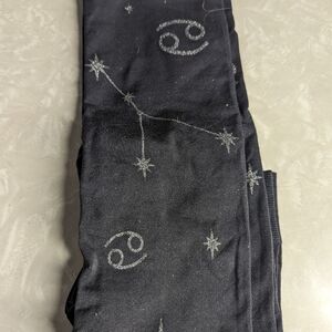 Snag tights women's size D (L) in sparkly zodiac  cancer pattern